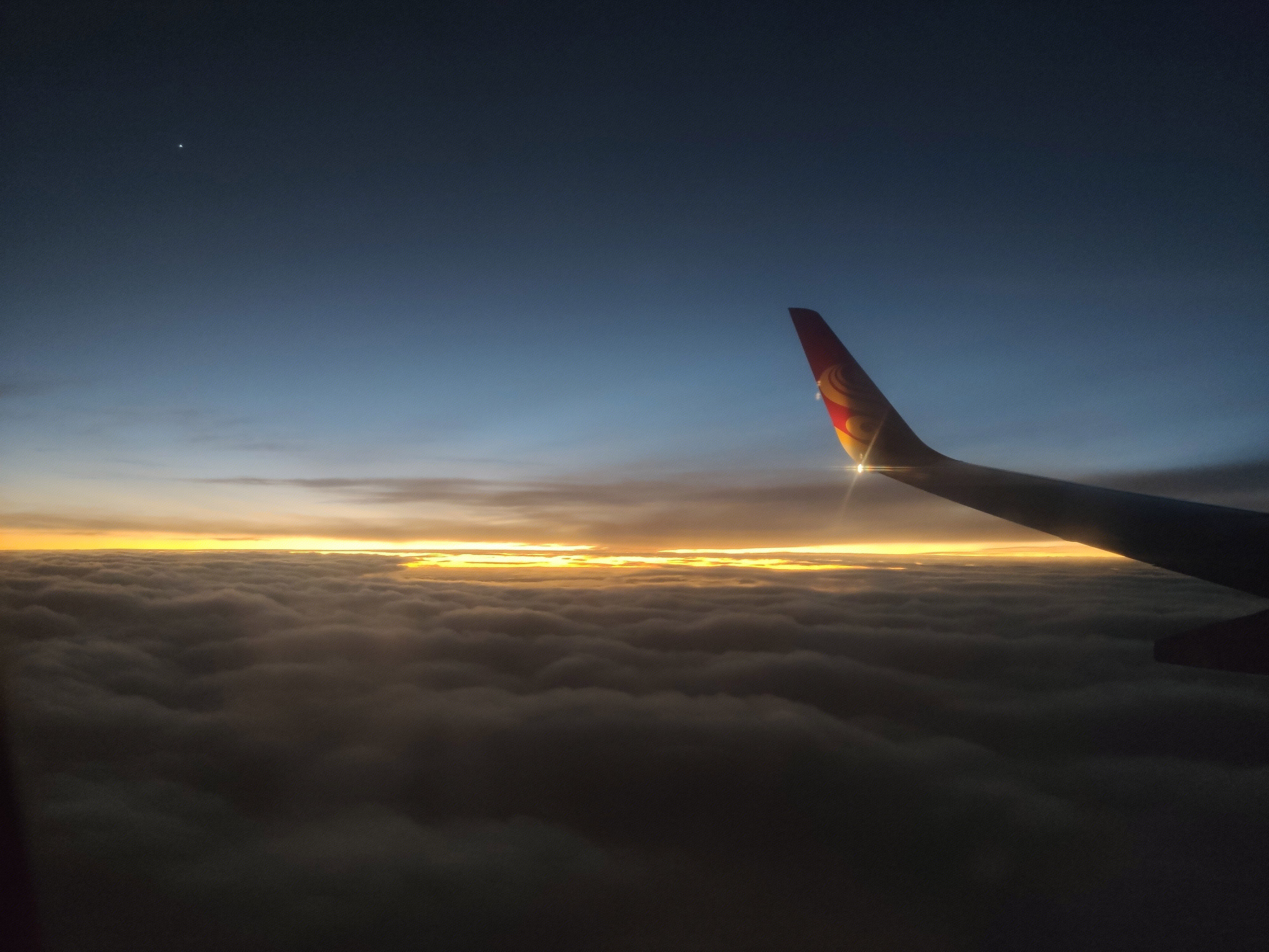 飞行 航班 飞机 海南航空 海航 天际 日落 乌云