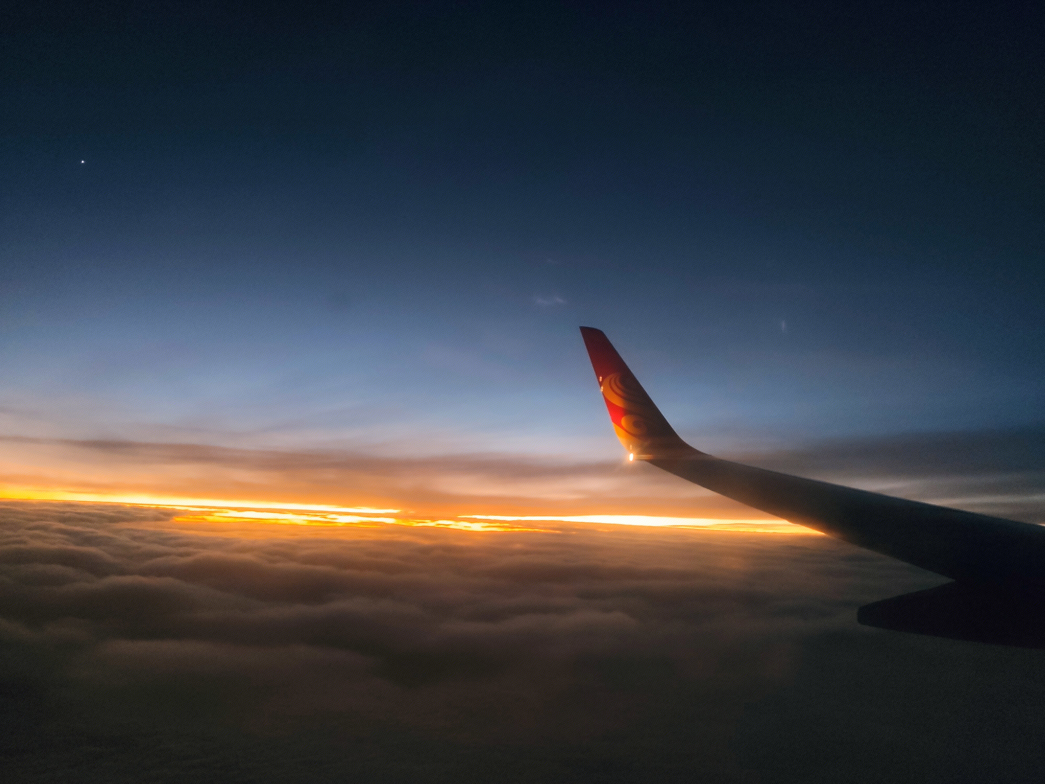 飞行 航班 飞机 海南航空 海航 天际 日落 乌云