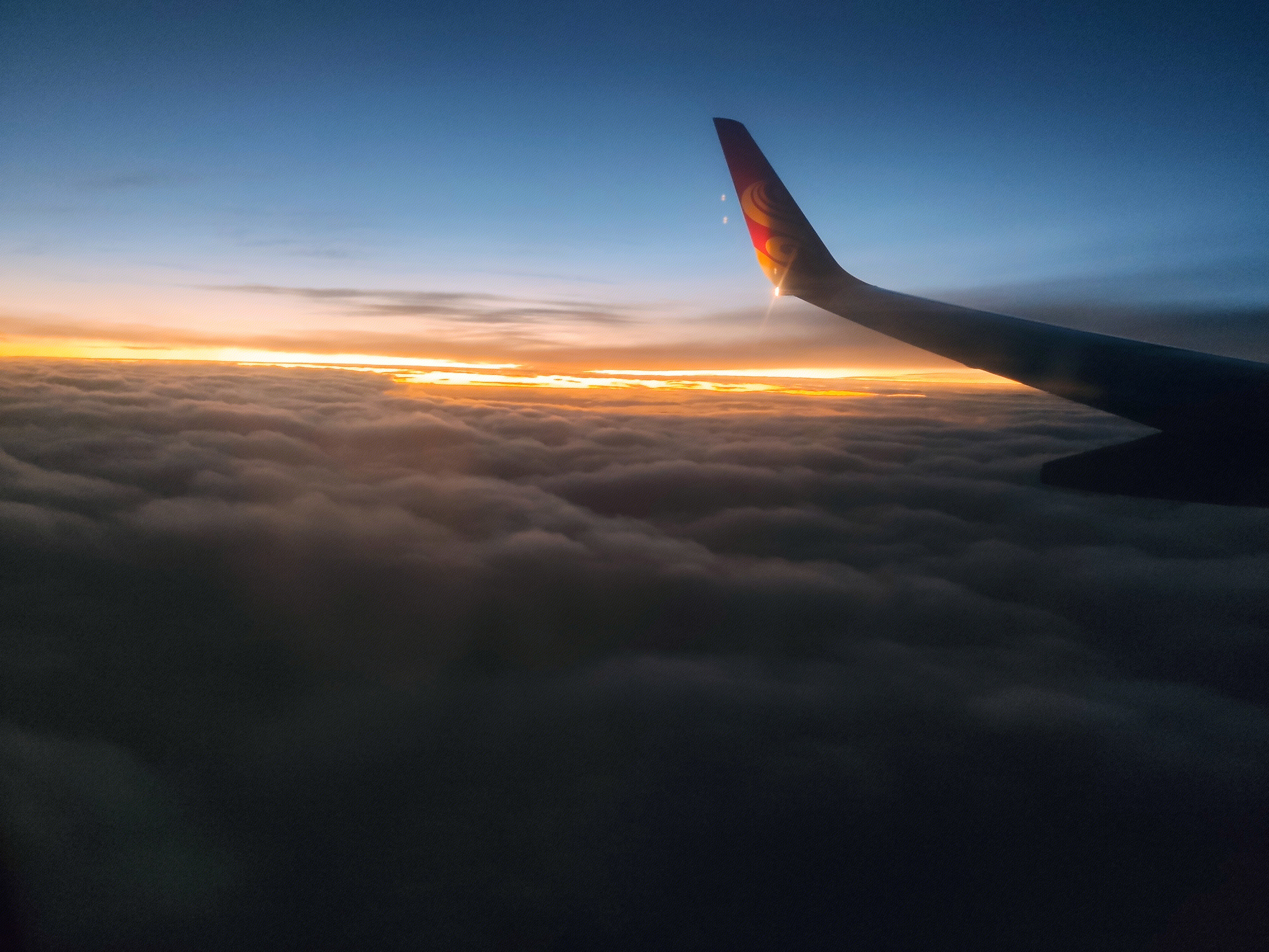 飞行 航班 飞机 海南航空 海航 天际 日落 乌云